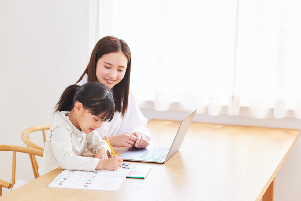 Mother and Daughter Studying Together